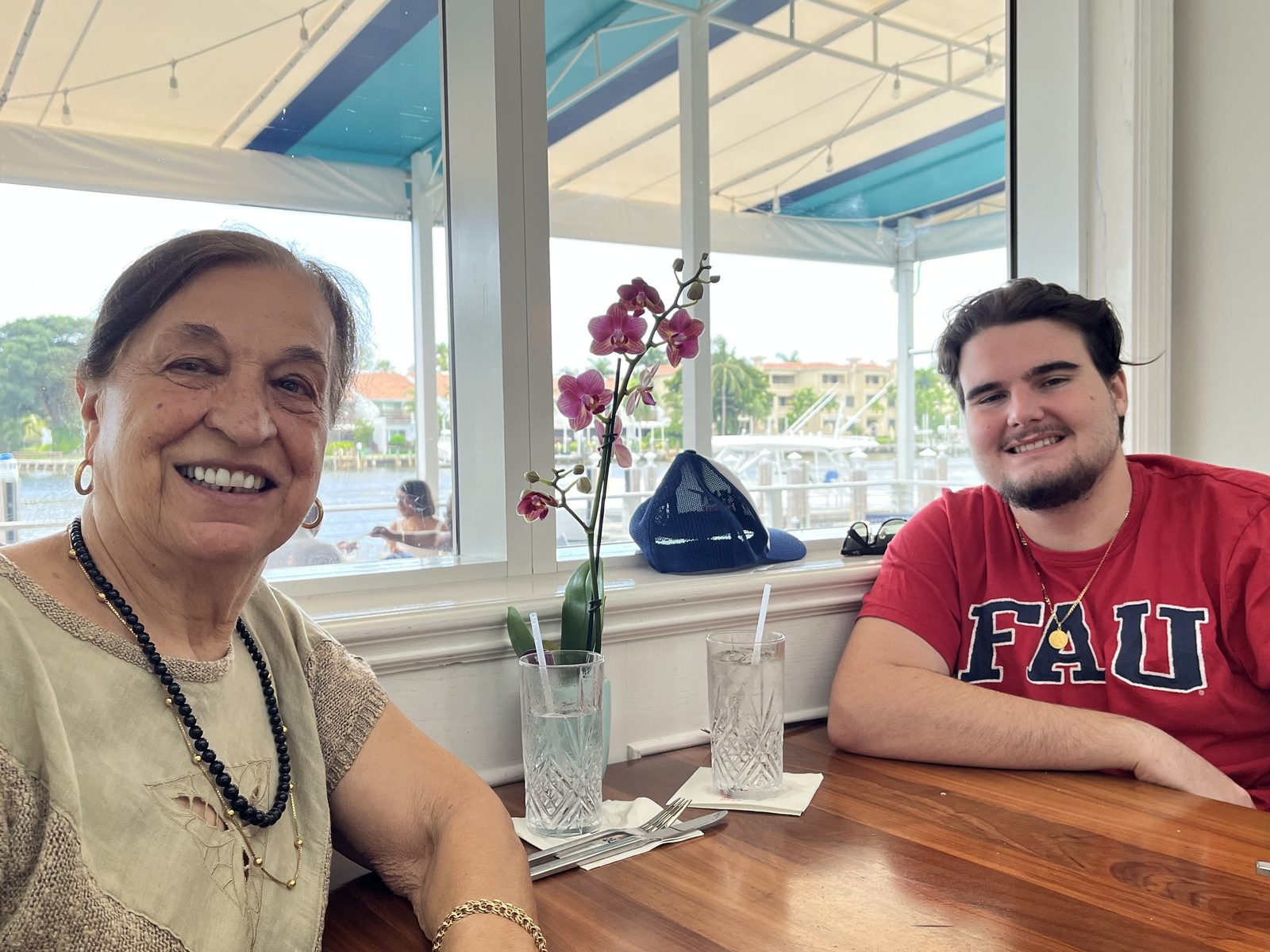 Nonna Do enjoying lunch by the water