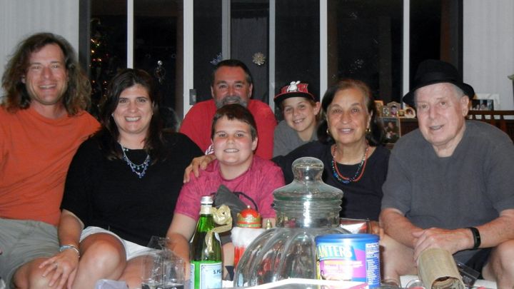 The Benvin family smiling together