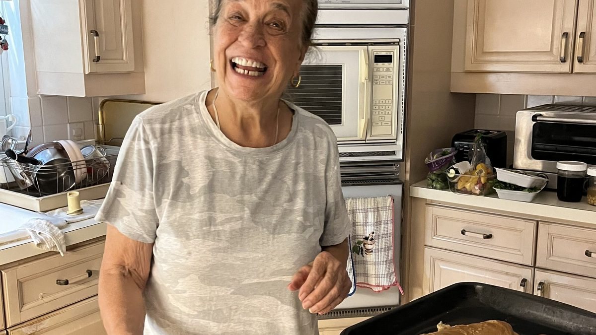 Nonna Do with her fresh olive bread